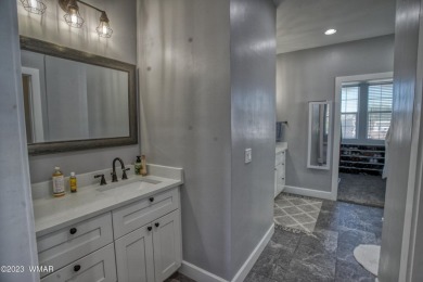 Gorgeous custom 6 bedroom 4.5 bathroom home in Frontier Estates on Snowflake Municipal Golf Course in Arizona - for sale on GolfHomes.com, golf home, golf lot