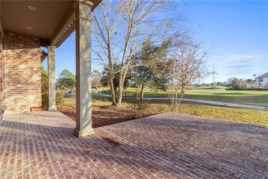 Enjoy serene water and golf course views from this exceptional on Oak Harbor Golf Club in Louisiana - for sale on GolfHomes.com, golf home, golf lot