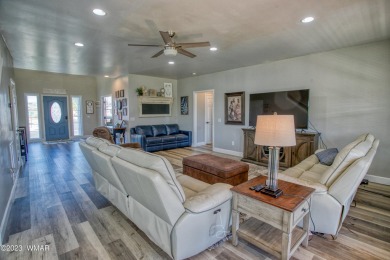 Gorgeous custom 6 bedroom 4.5 bathroom home in Frontier Estates on Snowflake Municipal Golf Course in Arizona - for sale on GolfHomes.com, golf home, golf lot