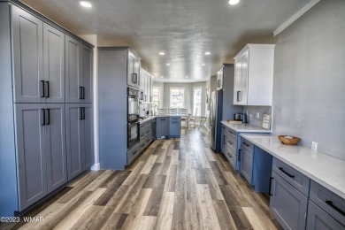 Gorgeous custom 6 bedroom 4.5 bathroom home in Frontier Estates on Snowflake Municipal Golf Course in Arizona - for sale on GolfHomes.com, golf home, golf lot