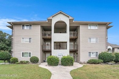 Welcome to 815 Colony Drive, Unit F, in beautiful Sunset Beach on Sea Trail Golf Resort in North Carolina - for sale on GolfHomes.com, golf home, golf lot