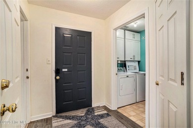 Welcome to 815 Colony Drive, Unit F, in beautiful Sunset Beach on Sea Trail Golf Resort in North Carolina - for sale on GolfHomes.com, golf home, golf lot