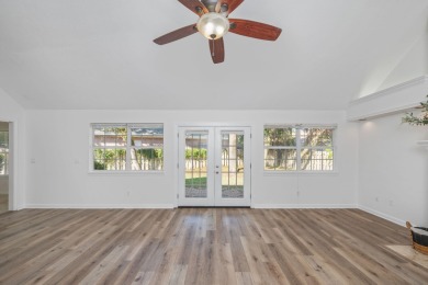 Perfectly positioned on a high corner lot, this 2,663 square on Shalimar Pointe Golf and Country Club in Florida - for sale on GolfHomes.com, golf home, golf lot
