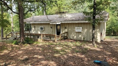 Escape to the country in scenic and relaxing Holly Lake Ranch on Holly Lake Ranch Golf Club in Texas - for sale on GolfHomes.com, golf home, golf lot