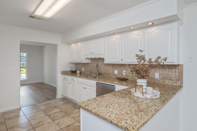 Perfectly positioned on a high corner lot, this 2,663 square on Shalimar Pointe Golf and Country Club in Florida - for sale on GolfHomes.com, golf home, golf lot