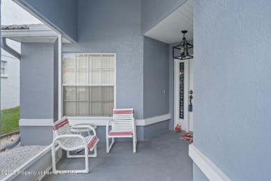 Welcome to the serene GlenLakes golf lifestyle! This move-in on Glen Lakes Country Club in Florida - for sale on GolfHomes.com, golf home, golf lot