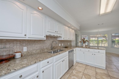 Perfectly positioned on a high corner lot, this 2,663 square on Shalimar Pointe Golf and Country Club in Florida - for sale on GolfHomes.com, golf home, golf lot