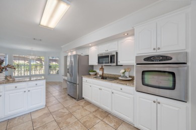 Perfectly positioned on a high corner lot, this 2,663 square on Shalimar Pointe Golf and Country Club in Florida - for sale on GolfHomes.com, golf home, golf lot