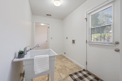 Perfectly positioned on a high corner lot, this 2,663 square on Shalimar Pointe Golf and Country Club in Florida - for sale on GolfHomes.com, golf home, golf lot