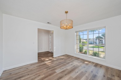 Perfectly positioned on a high corner lot, this 2,663 square on Shalimar Pointe Golf and Country Club in Florida - for sale on GolfHomes.com, golf home, golf lot