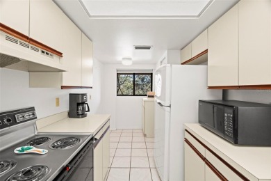 BEAUTIFUL END UNIT on the 2nd floor with stunning golf course on Tarpon Springs Golf Course in Florida - for sale on GolfHomes.com, golf home, golf lot