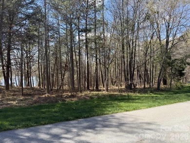 Gorgeous waterfront lot located within the gated community of on Old North State Club at Uwharrie Point Golf community in North Carolina - for sale on GolfHomes.com, golf home, golf lot