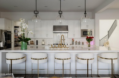 Indulge in refined luxury in this extraordinary Toll Brothers on Sterling Grove Golf & Country Club in Arizona - for sale on GolfHomes.com, golf home, golf lot