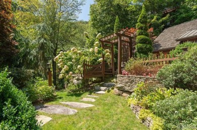 A gardener's delight with mountain and golf views, this on Old Edwards Club in North Carolina - for sale on GolfHomes.com, golf home, golf lot