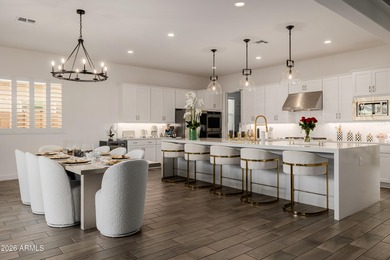 Indulge in refined luxury in this extraordinary Toll Brothers on Sterling Grove Golf & Country Club in Arizona - for sale on GolfHomes.com, golf home, golf lot