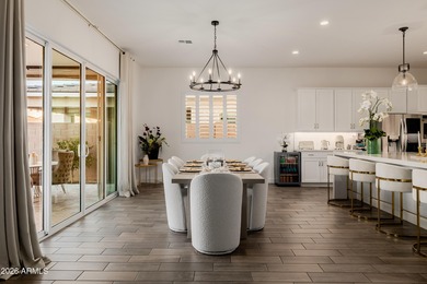 Indulge in refined luxury in this extraordinary Toll Brothers on Sterling Grove Golf & Country Club in Arizona - for sale on GolfHomes.com, golf home, golf lot