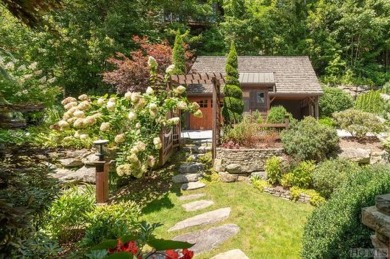 A gardener's delight with mountain and golf views, this on Old Edwards Club in North Carolina - for sale on GolfHomes.com, golf home, golf lot