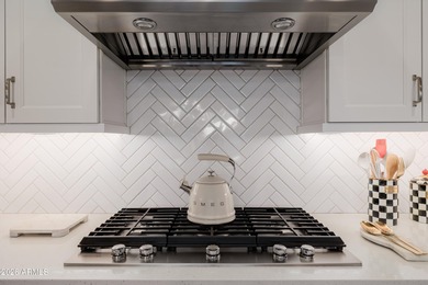 Indulge in refined luxury in this extraordinary Toll Brothers on Sterling Grove Golf & Country Club in Arizona - for sale on GolfHomes.com, golf home, golf lot