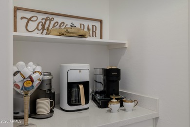 Indulge in refined luxury in this extraordinary Toll Brothers on Sterling Grove Golf & Country Club in Arizona - for sale on GolfHomes.com, golf home, golf lot