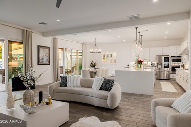 Indulge in refined luxury in this extraordinary Toll Brothers on Sterling Grove Golf & Country Club in Arizona - for sale on GolfHomes.com, golf home, golf lot