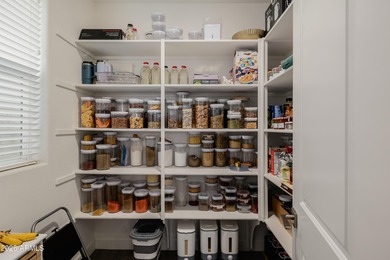 Indulge in refined luxury in this extraordinary Toll Brothers on Sterling Grove Golf & Country Club in Arizona - for sale on GolfHomes.com, golf home, golf lot