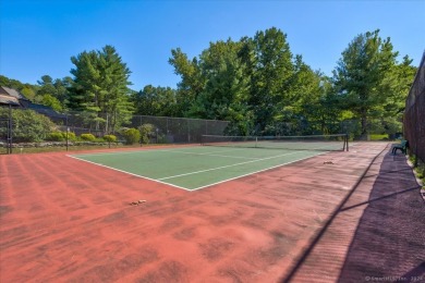 Welcome to 58 Crocus Lane, a stunning 2nd-floor end unit in the on Farmington Woods Country Club in Connecticut - for sale on GolfHomes.com, golf home, golf lot