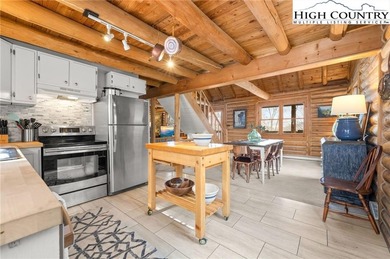 Turn-key, fully furnished mountain cabin just steps from the ski on Sugar Mountain Golf Course in North Carolina - for sale on GolfHomes.com, golf home, golf lot