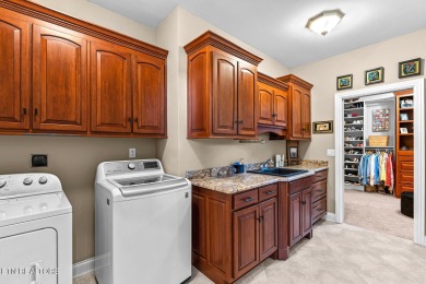 Welcome to 1217 Kahite Trail, an exquisite golf front home on Tellico Village -The Links At Kahite Golf Course in Tennessee - for sale on GolfHomes.com, golf home, golf lot