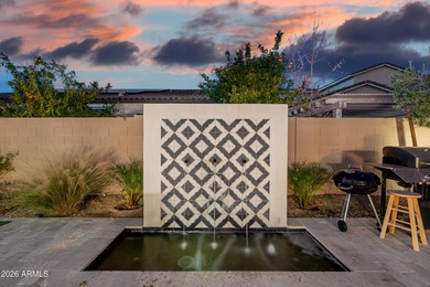 Indulge in refined luxury in this extraordinary Toll Brothers on Sterling Grove Golf & Country Club in Arizona - for sale on GolfHomes.com, golf home, golf lot