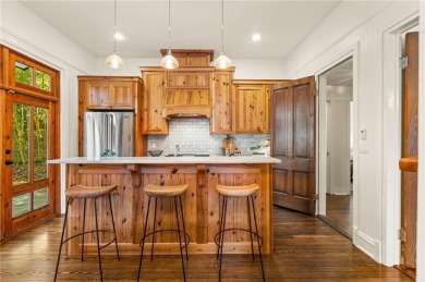 Step into a world of timeless luxury in the heart of Candler on Candler Park Golf Course in Georgia - for sale on GolfHomes.com, golf home, golf lot