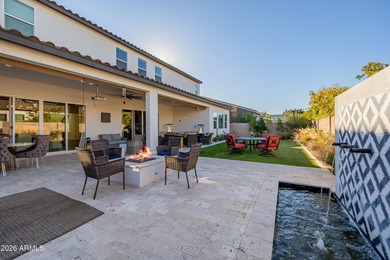 Indulge in refined luxury in this extraordinary Toll Brothers on Sterling Grove Golf & Country Club in Arizona - for sale on GolfHomes.com, golf home, golf lot