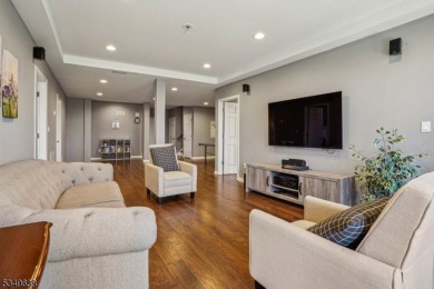 Welcome to this stunning renovated three-level end unit on New Jersey National Golf Club in New Jersey - for sale on GolfHomes.com, golf home, golf lot