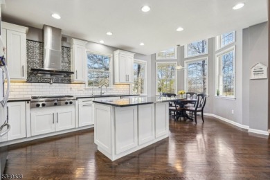 Welcome to this stunning renovated three-level end unit on New Jersey National Golf Club in New Jersey - for sale on GolfHomes.com, golf home, golf lot