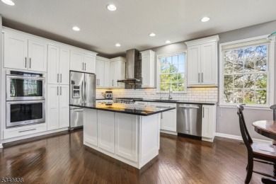 Welcome to this stunning renovated three-level end unit on New Jersey National Golf Club in New Jersey - for sale on GolfHomes.com, golf home, golf lot