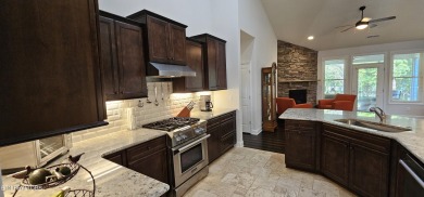 Discover the epitome of upscale living in this meticulously on Tellico Village -The Links At Kahite Golf Course in Tennessee - for sale on GolfHomes.com, golf home, golf lot
