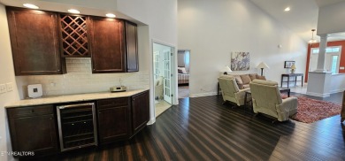 Discover the epitome of upscale living in this meticulously on Tellico Village -The Links At Kahite Golf Course in Tennessee - for sale on GolfHomes.com, golf home, golf lot