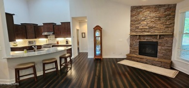 Discover the epitome of upscale living in this meticulously on Tellico Village -The Links At Kahite Golf Course in Tennessee - for sale on GolfHomes.com, golf home, golf lot