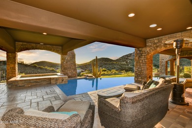 Incredibly welll sited on an elevated hillside above the 4th on Gold Canyon Golf Resort - Sidewinder in Arizona - for sale on GolfHomes.com, golf home, golf lot