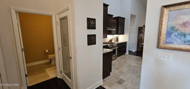 Discover the epitome of upscale living in this meticulously on Tellico Village -The Links At Kahite Golf Course in Tennessee - for sale on GolfHomes.com, golf home, golf lot