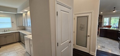 Discover the epitome of upscale living in this meticulously on Tellico Village -The Links At Kahite Golf Course in Tennessee - for sale on GolfHomes.com, golf home, golf lot