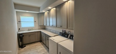 Discover the epitome of upscale living in this meticulously on Tellico Village -The Links At Kahite Golf Course in Tennessee - for sale on GolfHomes.com, golf home, golf lot