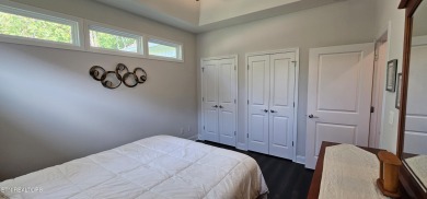Discover the epitome of upscale living in this meticulously on Tellico Village -The Links At Kahite Golf Course in Tennessee - for sale on GolfHomes.com, golf home, golf lot