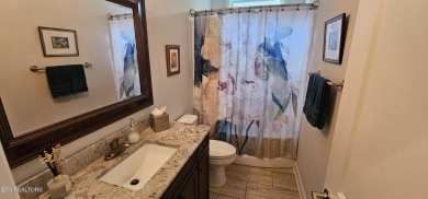 Discover the epitome of upscale living in this meticulously on Tellico Village -The Links At Kahite Golf Course in Tennessee - for sale on GolfHomes.com, golf home, golf lot