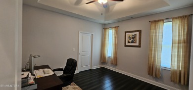 Discover the epitome of upscale living in this meticulously on Tellico Village -The Links At Kahite Golf Course in Tennessee - for sale on GolfHomes.com, golf home, golf lot
