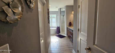 Discover the epitome of upscale living in this meticulously on Tellico Village -The Links At Kahite Golf Course in Tennessee - for sale on GolfHomes.com, golf home, golf lot