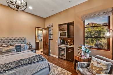 Incredibly welll sited on an elevated hillside above the 4th on Gold Canyon Golf Resort - Sidewinder in Arizona - for sale on GolfHomes.com, golf home, golf lot