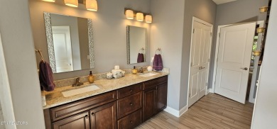 Discover the epitome of upscale living in this meticulously on Tellico Village -The Links At Kahite Golf Course in Tennessee - for sale on GolfHomes.com, golf home, golf lot