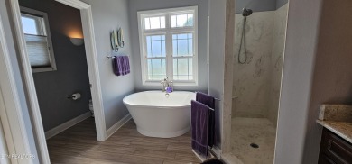 Discover the epitome of upscale living in this meticulously on Tellico Village -The Links At Kahite Golf Course in Tennessee - for sale on GolfHomes.com, golf home, golf lot