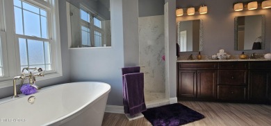 Discover the epitome of upscale living in this meticulously on Tellico Village -The Links At Kahite Golf Course in Tennessee - for sale on GolfHomes.com, golf home, golf lot