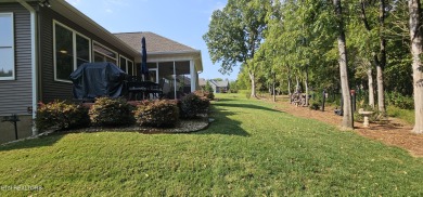 Discover the epitome of upscale living in this meticulously on Tellico Village -The Links At Kahite Golf Course in Tennessee - for sale on GolfHomes.com, golf home, golf lot